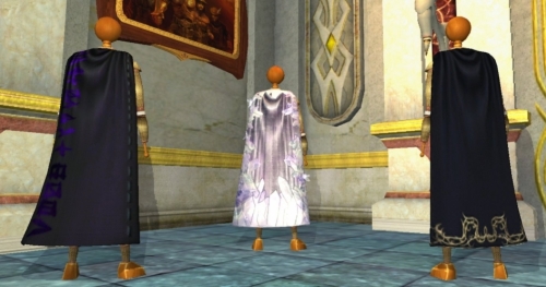 left to right: the Cloak of Runes, the Cloak of Crystal Shards and the Assassin Master's Cloak 